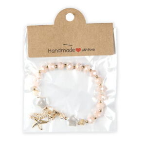 Elastične narukvice sa cirkonima, konjicem i zvijezdom (SET 12 kom.)